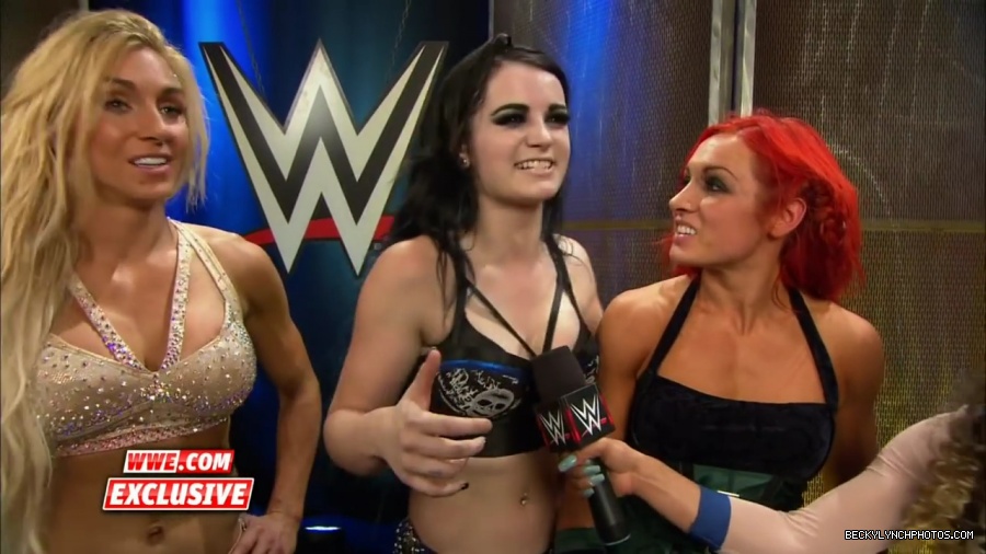 PCB_celebrate_their_big_win_at_Summerslam__WWE_com_Exclusive2C_August_232C_2015_mp41954.jpg