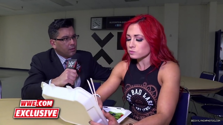 Becky_Lynch_refuses_to_let_Emma_ruin_her_meal__Raw_Fallout2C_April_252C_2016_mp42021.jpg