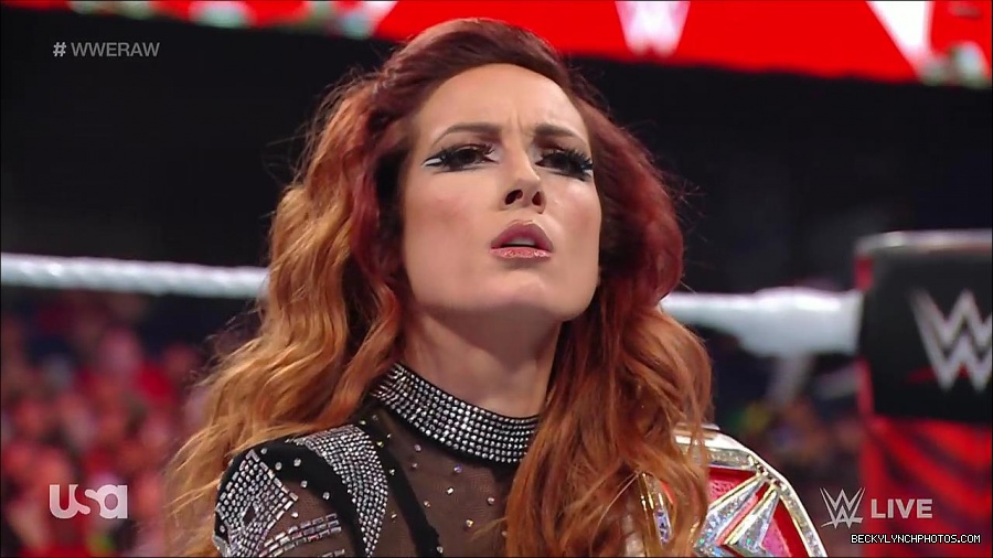 WWE_RAW_21st_March_2022_720p_WEBRip_h264-TJ_mp4_003978352.jpg