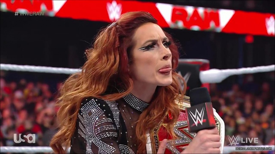 WWE_RAW_21st_March_2022_720p_WEBRip_h264-TJ_mp4_003980354.jpg