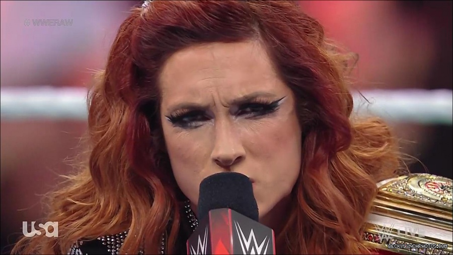 WWE_RAW_21st_March_2022_720p_WEBRip_h264-TJ_mp4_004056279.jpg