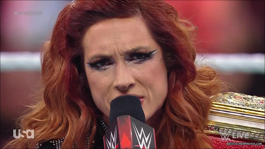 WWE_RAW_21st_March_2022_720p_WEBRip_h264-TJ_mp4_004057481.jpg
