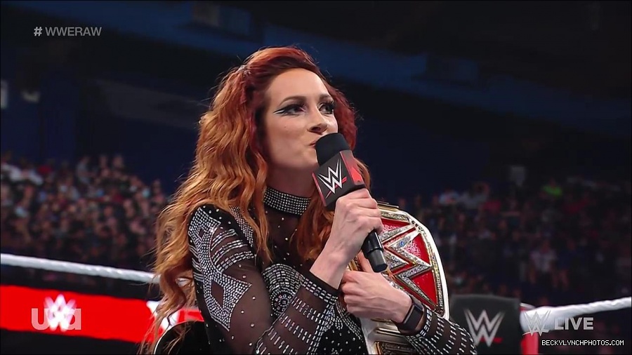 WWE_RAW_21st_March_2022_720p_WEBRip_h264-TJ_mp4_004108331.jpg