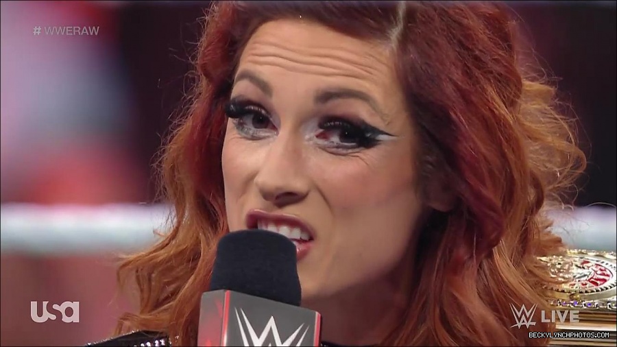 WWE_RAW_21st_March_2022_720p_WEBRip_h264-TJ_mp4_004135959.jpg