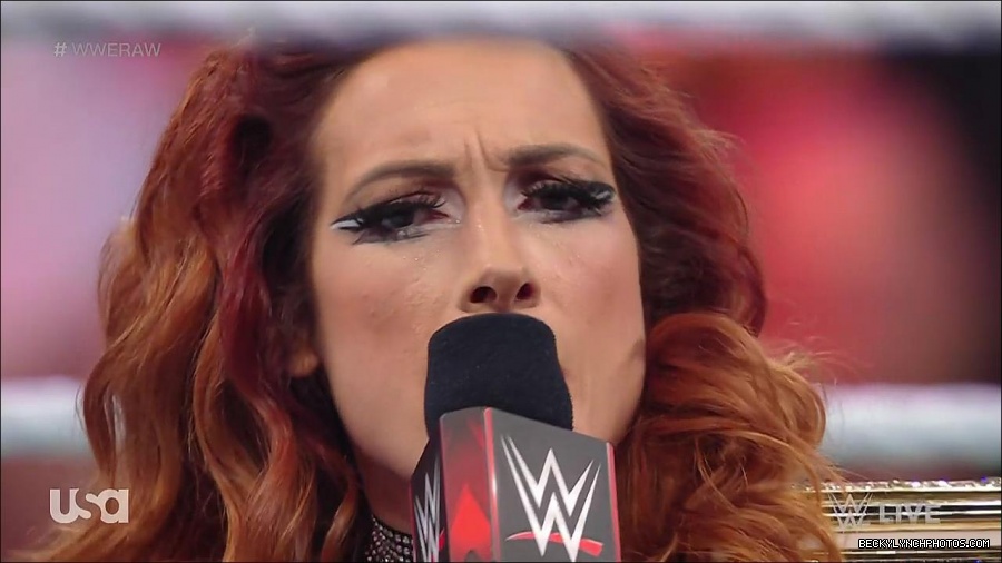 WWE_RAW_21st_March_2022_720p_WEBRip_h264-TJ_mp4_004150373.jpg