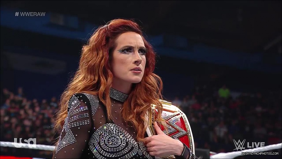 WWE_RAW_21st_March_2022_720p_WEBRip_h264-TJ_mp4_004186810.jpg