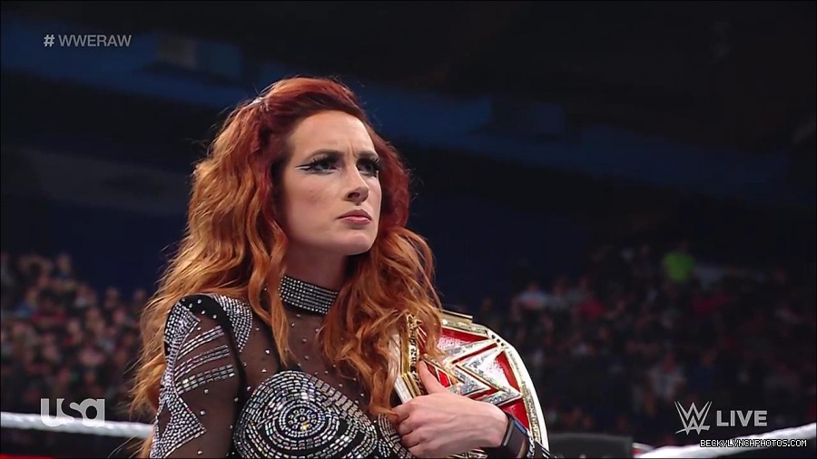WWE_RAW_21st_March_2022_720p_WEBRip_h264-TJ_mp4_004189613.jpg