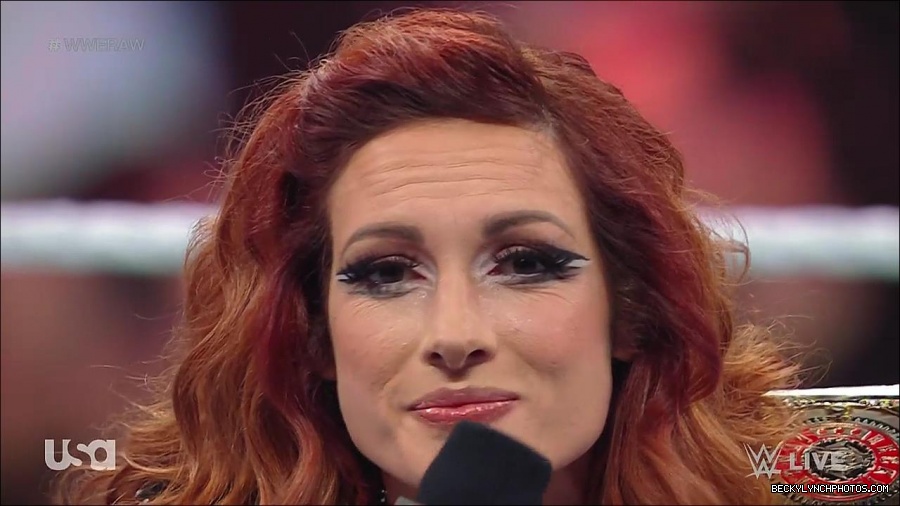 WWE_RAW_21st_March_2022_720p_WEBRip_h264-TJ_mp4_004219643.jpg