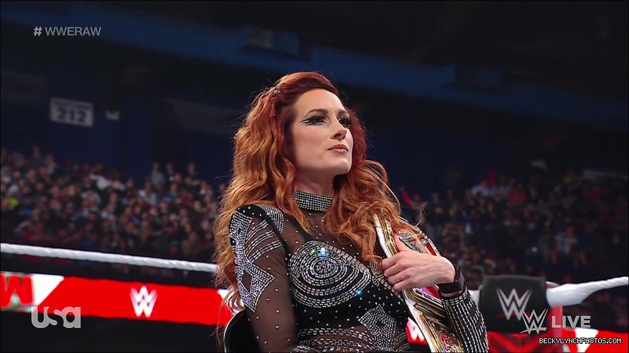 WWE_RAW_21st_March_2022_720p_WEBRip_h264-TJ_mp4_004226850.jpg