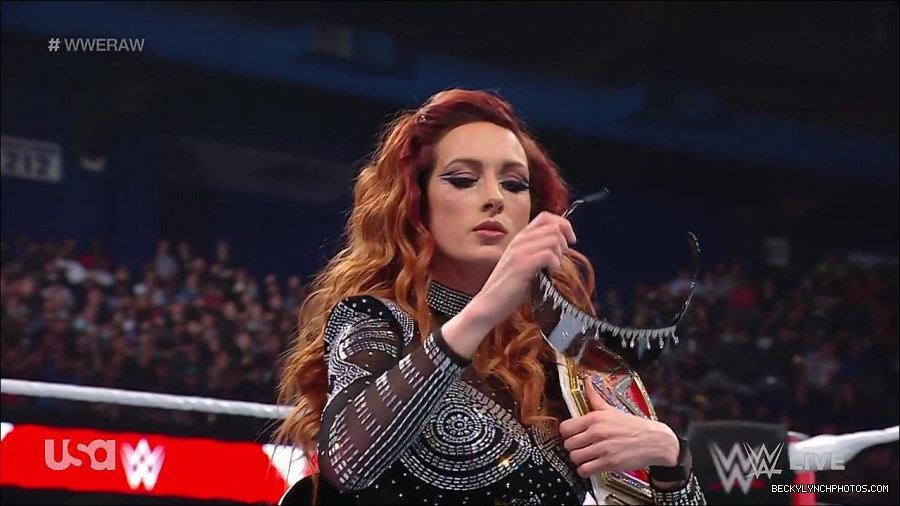 WWE_RAW_21st_March_2022_720p_WEBRip_h264-TJ_mp4_004231254.jpg