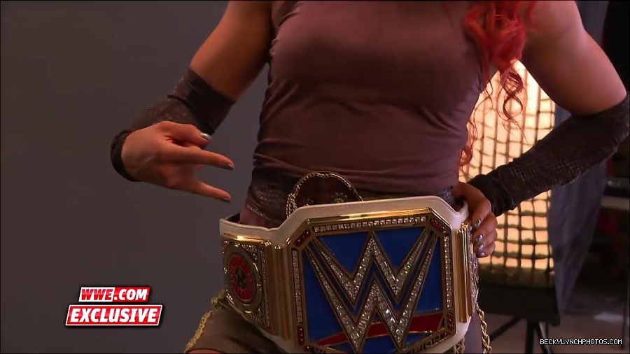 Y2Mate_is_-_Becky_Lynch_is_photographed_as_SmackDown_Women_s_Champion_Sept__132C_2016-mAPhiSWTcLA-720p-1655905971639_mp4_000013500.jpg